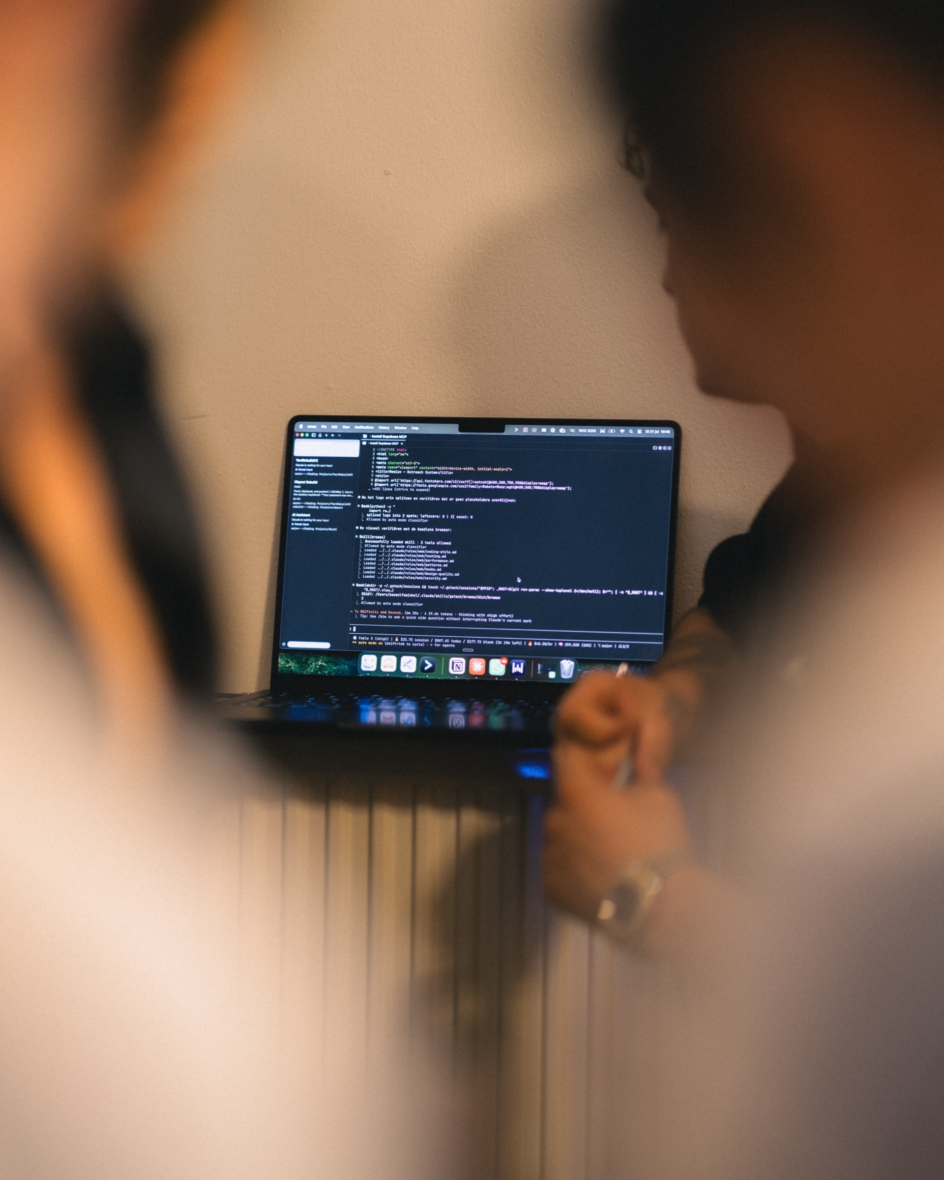 A laptop with work in progress in the SKUU office