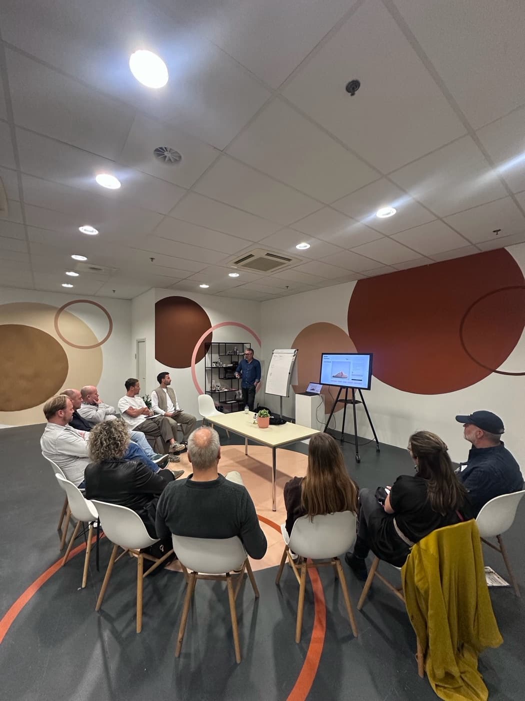 A round-table session at Beyond the Trend, seen from behind the attendees.